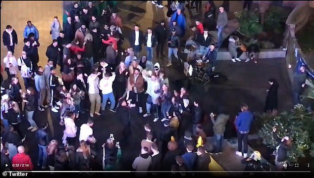 Crowds party in London’s Leicester Square as pubs close at 10pm