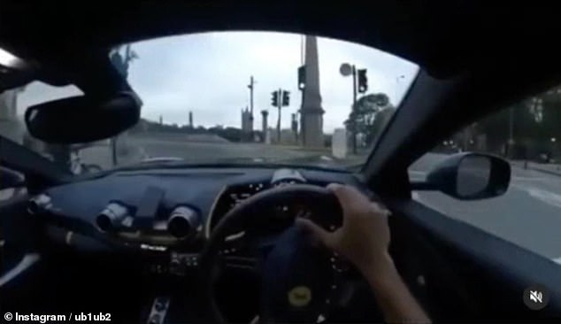 Ferrari driver speeds across a London bridge and spins wildly out of control, smashing into a wall