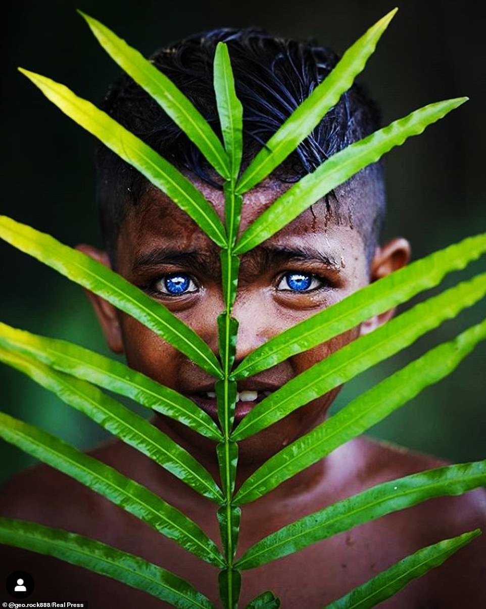 Indonesian tribe with extremely rare electric blue eyes due to genetic fluke photographed