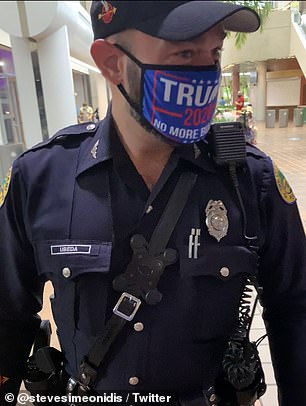 Miami cop faces discipline after wearing Trump face mask at polling place in full uniform