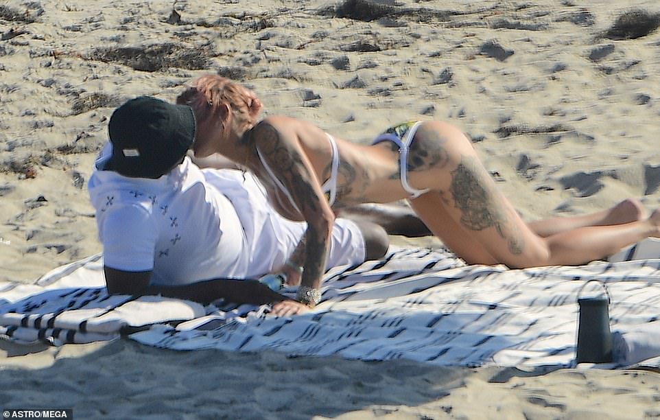 PICTURE EXCLUSIVE: Sean ‘Diddy’ Combs kisses Brian Austin Green’s tattooed model ex Tina Louise