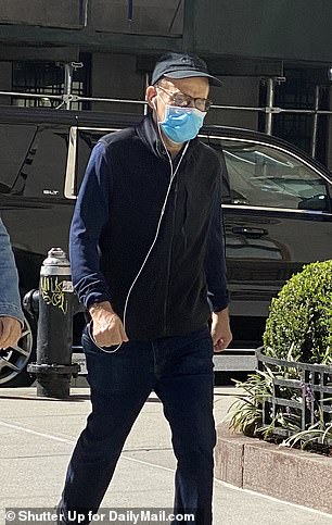 Rick Moranis, 67, goes for a walk after NYC attack