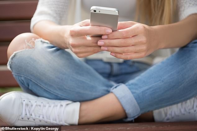 Why texting is GOOD for your teen: Smartphone addiction may boost children’s mental health