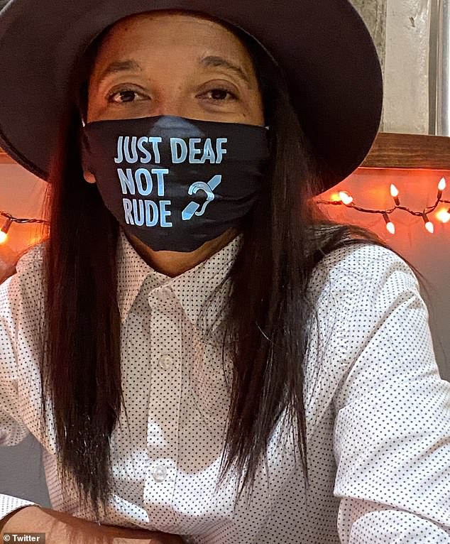 Kelli Adrienne Duncan, 43, was flying from Tampa to Hartford, Connecticut, with a friend earlier this month, wearing this mask to inform people she is deaf