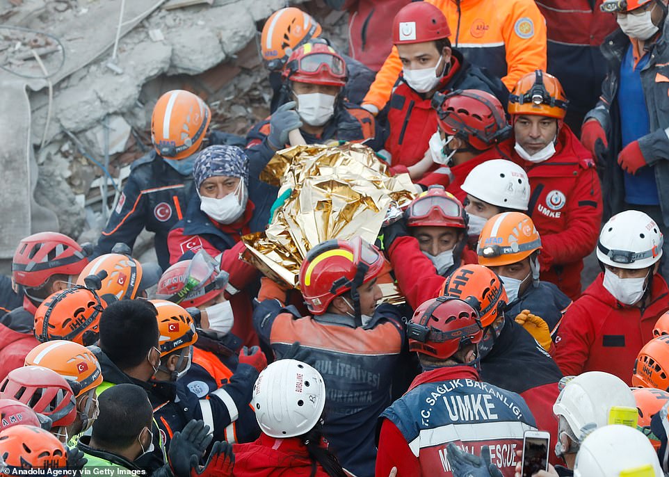 Three-year-old girl, Elif Perincek, is pulled from the debris after 65 hours under the rubble following a magnitude 6.6 quake shook Turkey's Aegean Sea coast, in Izmir