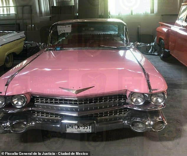A vintage pink Cadillac El Dorado parked in the indoor garage of Raymundo Collins' coastal mansion in the state of Morelos. The vehicle is part of 41 classic automobiles that were seized by Mexican investigators last Friday as part of an investigation into the former police chief's alleged corrupt dealings during his time as Mexico City's director for the Housing Institute