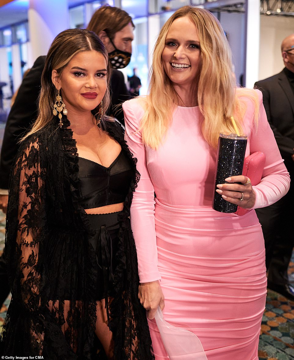 Gal pals: Morris also caught up with pal Miranda Lambert, who led the evening with seven nominations