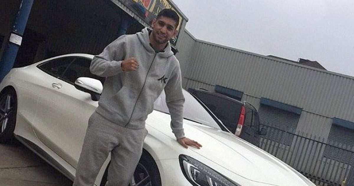 Khan wrecks his Mercedes after aquaplaning and smashing into barrier on motorway