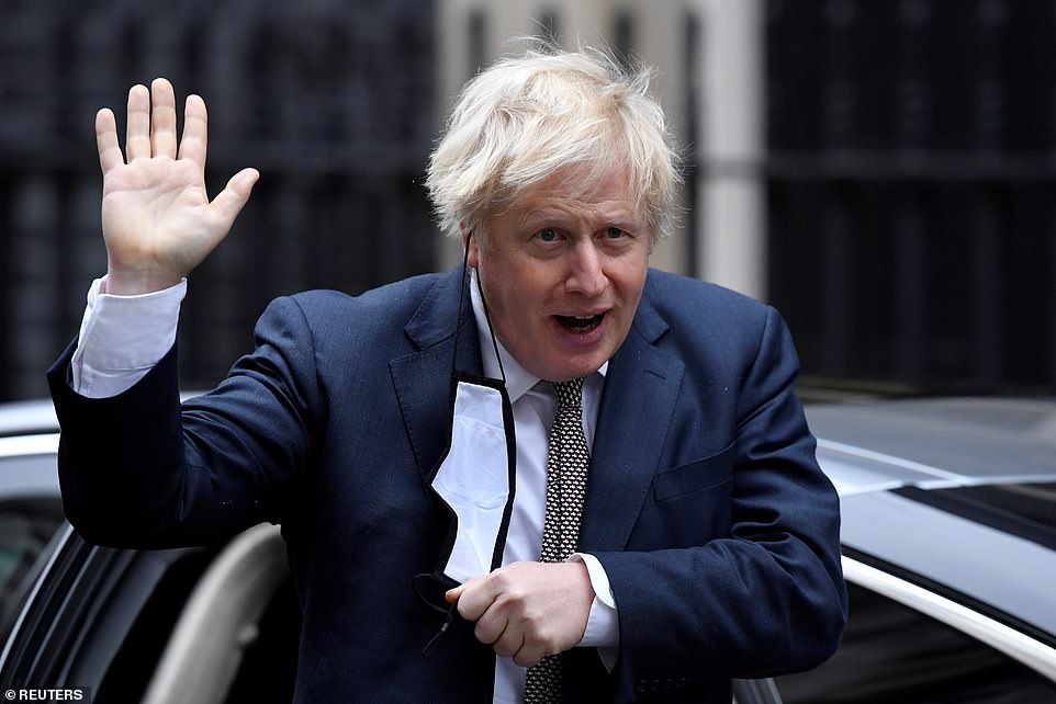 Mr Johnson looked happy to be out of self-isolation as he waved to photographers in Downing Street today