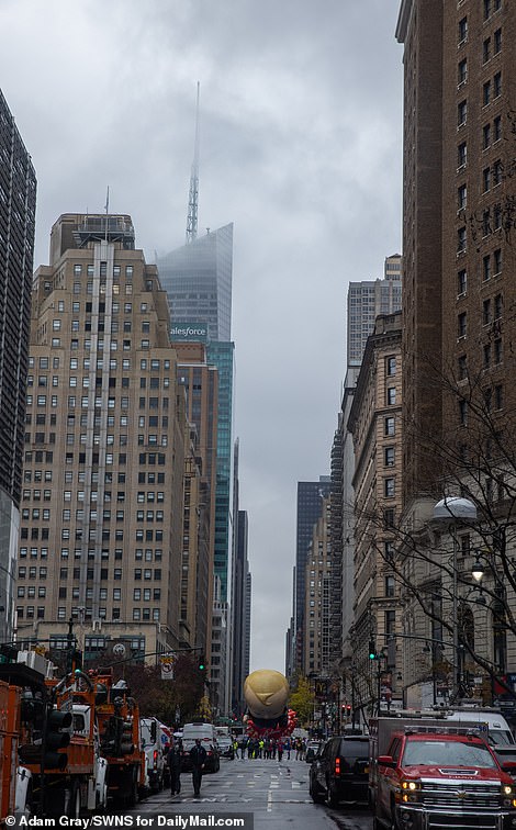 The scene was gloomy and rainy as the 94th annual Macy's Thanksgiving Day parade began