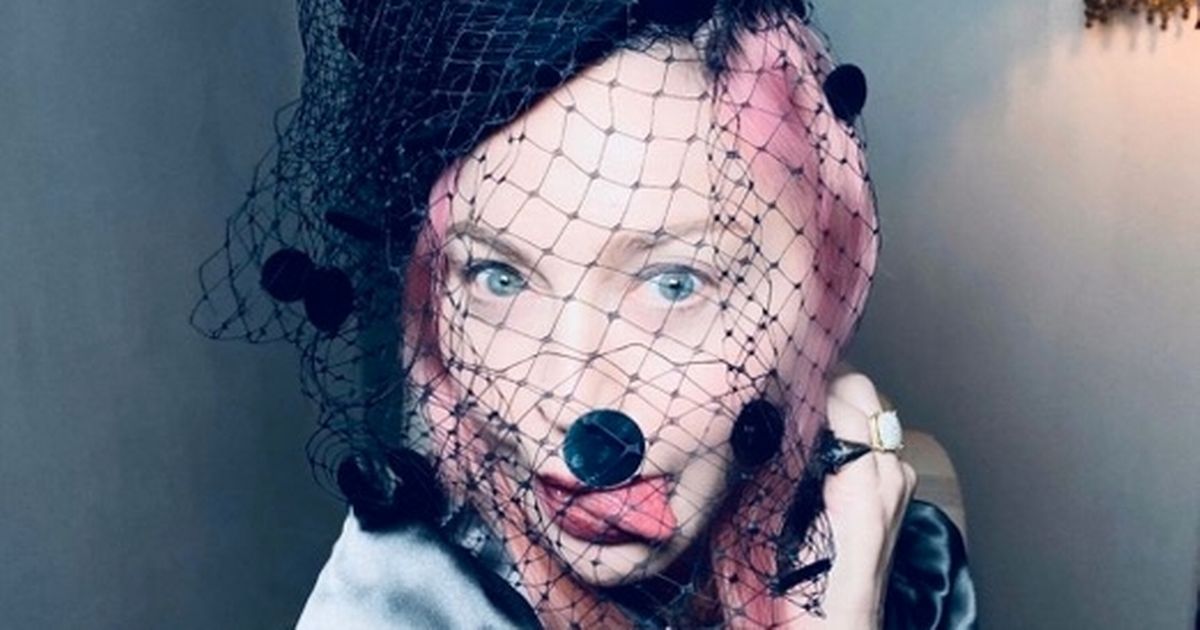 Madonna looks unrecognisable in cheeky selfies after fans feared she had died