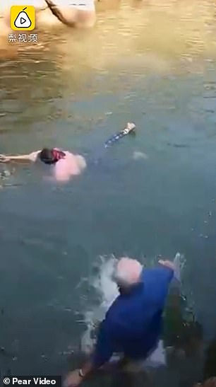 British diplomat jumps into a river to save a drowning woman in China