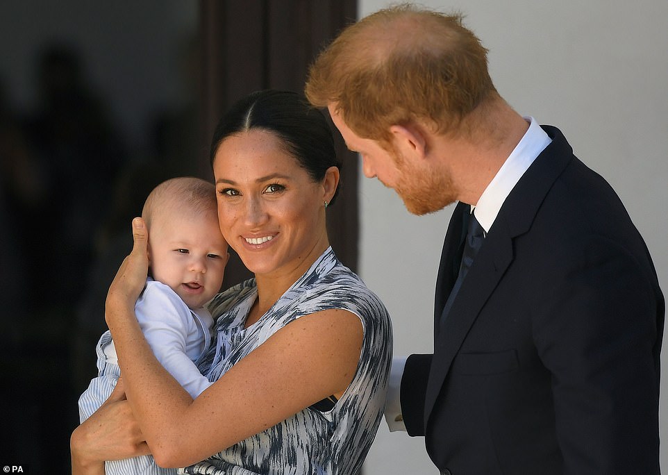 Charity groups today praised Meghan Markle (pictured with Archie and Prince Harry in 2019) after she revealed she suffered a miscarriage over the summer at her Los Angeles home