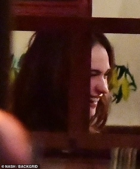 Did Lily James bend Tier Two rules? Actress and Dominic Cooper giggle during business dinner