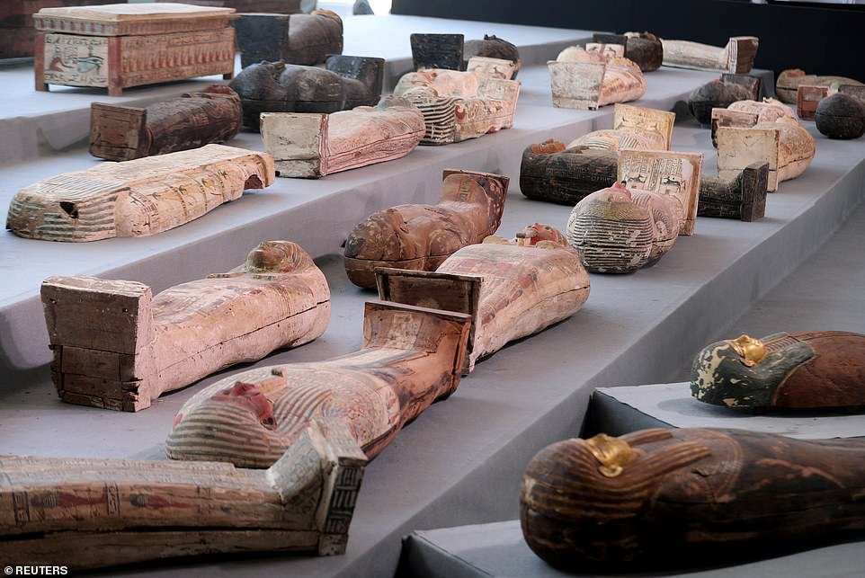 Egyptian officials unveil 100 sarcophagi found in vast necropolis near Cairo