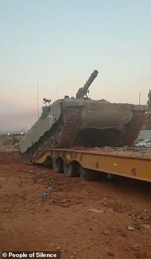 Israeli tank accelerates and flips onto its back