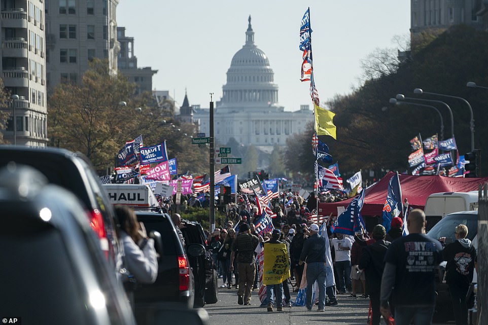 Trump fans swarm and cheer the President’s motorcade at the Million MAGA March 
