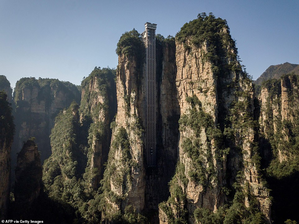 World’s highest outdoor lift: China’s gigantic elevator zips tourists up cliff that inspired Avatar