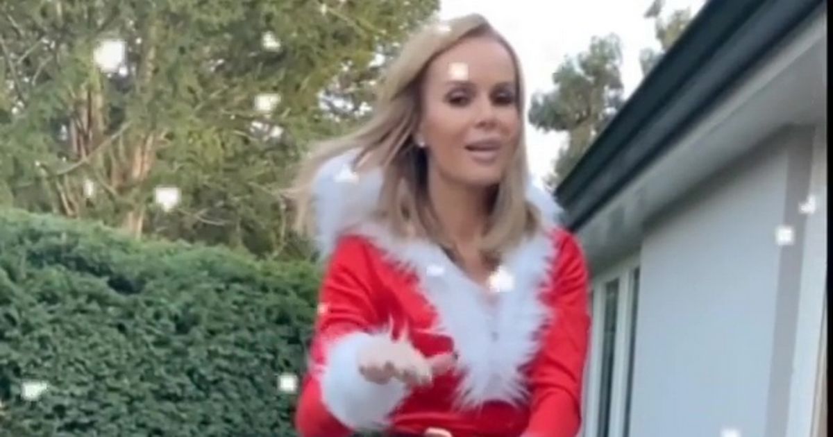 Amanda Holden stuns in skimpy Santa outfit as she catches up on household chores