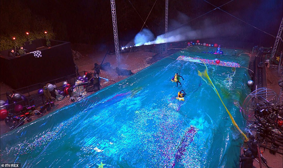 Tough: Every year the four finalists take part in the aqua challenge, with contestants having to fight their way up a slippery slope with stars, while being soaked by hoses and wind machine