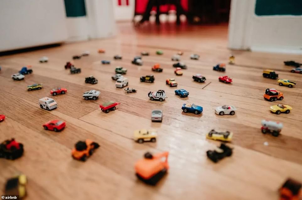 Toy cars litter the floors of the hallway, a necessary defense to prevent any would-be robbers from ransacking the place