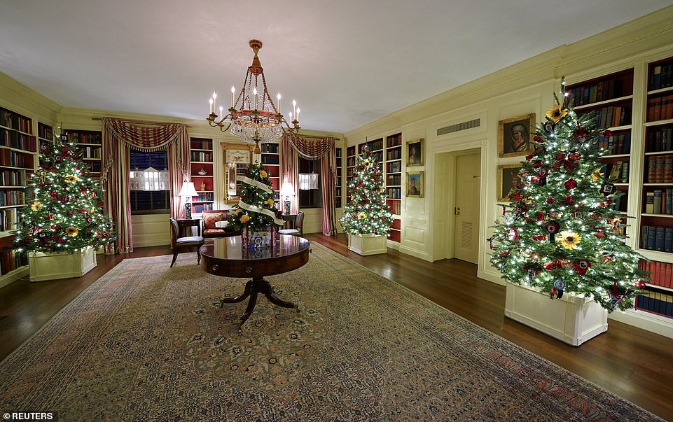 The decorations in the library are dedicated to the 100th anniversary of the 19th amendment, which gave women the right to vote. This is Melania Trump's final year overseeing the holiday decor at the White House