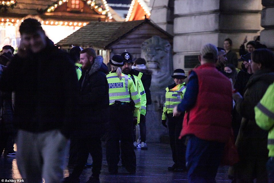 The UK today reported a further 15,539 Covid-19 cases. Of those, 252 were recorded in the county Nottinghamshire with 96 in Nottingham itself. Pictured: Police at the Nottingham Christmas market on Saturday