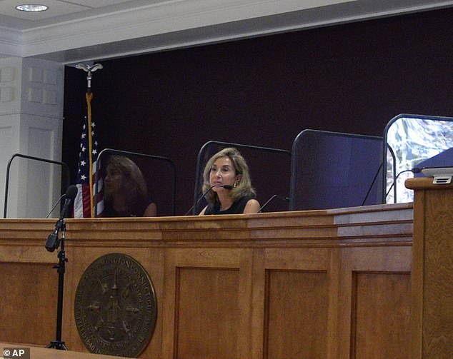 Probate Judge Evelyn Daly on Friday called for an in-person hearing on February 10, one day after the state’s executive orders placing coronavirus restrictions on court activities expires.  Judge Daly pictured above during a hearing in October where she said she needed more time and more evidence before deciding on whether to declare Jennifer Dulos dead