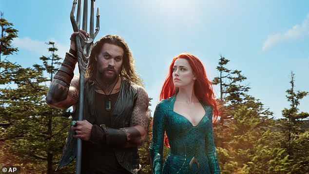 Action flick: Heard stars opposite Jason Momoa in the film and plays Mera, his love interest