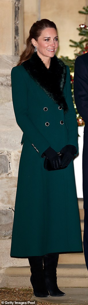 Kate added a faux fur collar to her emerald Catherine Walker coat this week when she met the Queen at Windsor Castle