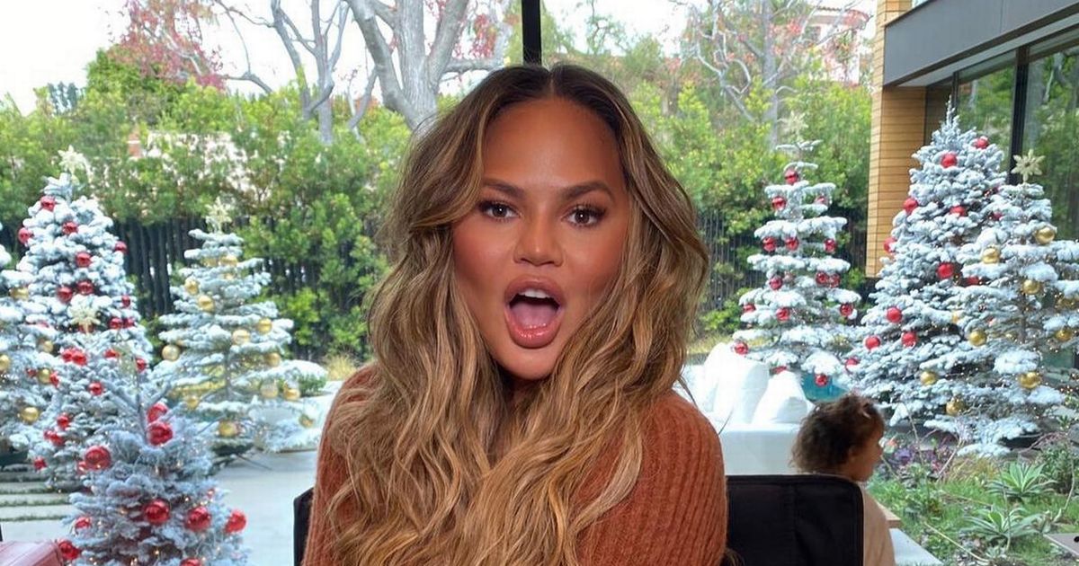 Chrissy Teigen turns home into winter wonderland as kids pose with 6 Xmas trees