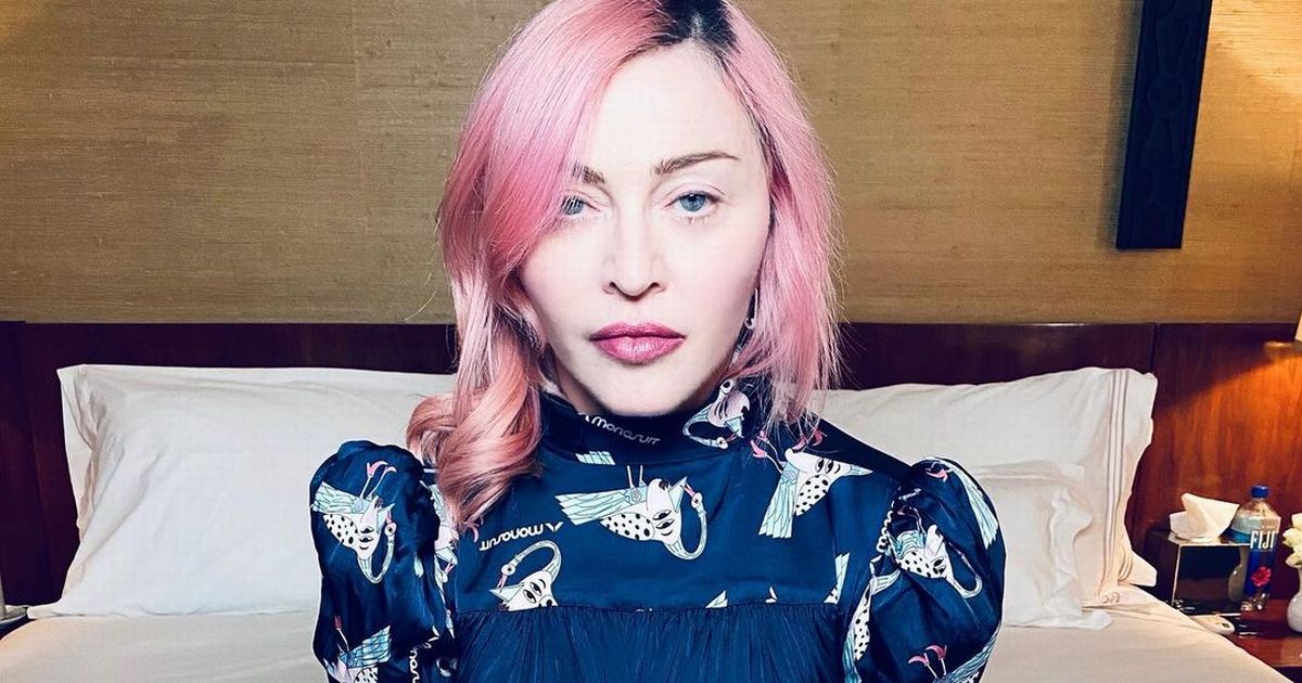 Madonna shares rare glimpse of twin daughters as they model colourful wigs
