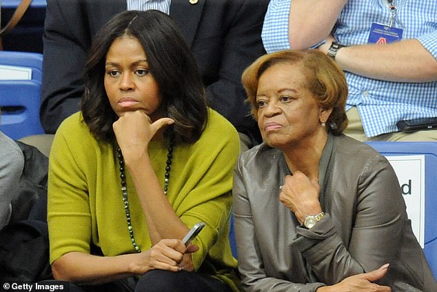 'If we say defund the police, not just white folks, but Michelle’s mom might say, "if I’m getting robbed who am I going to call?:' he said of his mother-in-law Marian Robinson, pictured above with Michelle Obama in 2014