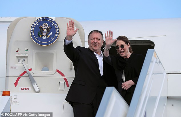 Pompeo (pictured with his wife Susan) became the first US official to publicly attribute the massive hacking campaign to Russia Friday