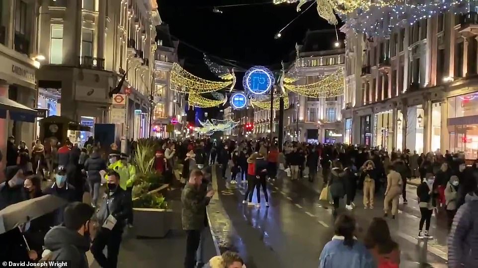 Footage on London's Regent Street showed huge crowds of last-minute shoppers stocking up on Christmas presents
