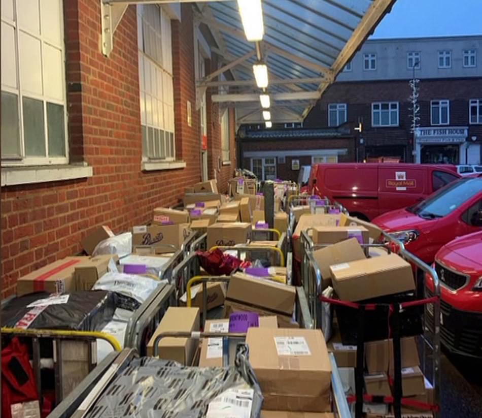 Sorting offices are so inundated that staff are having to stack items outside, putting parcels at risk of being damaged by rain or even stolen. Pictured is a site in Essex