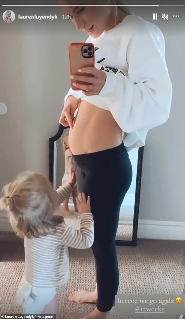 Bliss: The 29-year-old reality star stood in front of the mirror with her one-year-old daughter Alessi Ren after announcing she's expecting once again with husband Arie Luyendyk Jr.