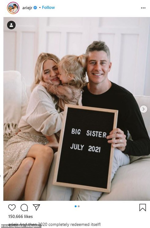 Baby on board: The Bachelor stars announced the happy news on Saturday with a sign saying 'Big Sister July 2021'