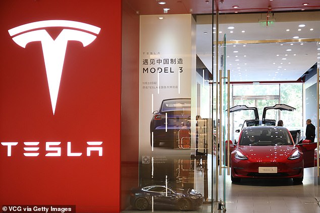 A Tesla Model 3 is seen at a showroom in Beijing in October