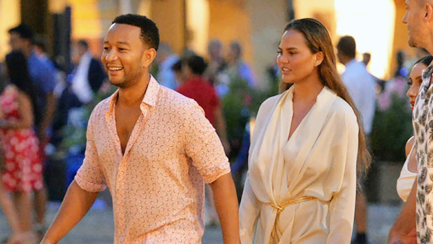 Chrissy Teigen Goes Hiking In A Plunging Black Swimsuit With John Legend During Much Needed Vacation