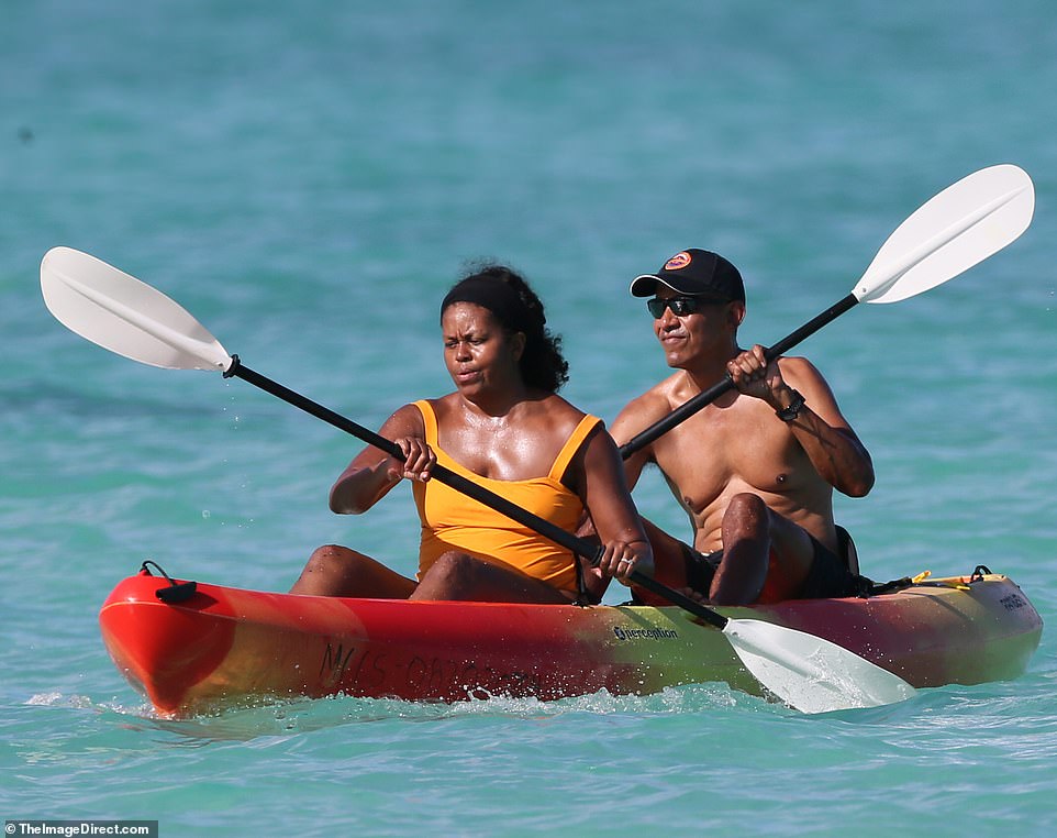 Finally! The former president started helping eventually, though the pair were paddling in opposite directions