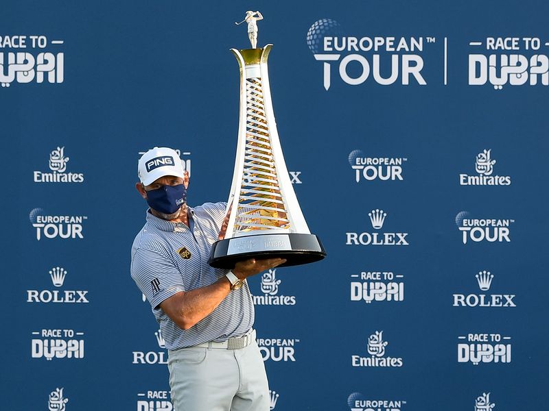 Lee Westwood with the Race to Dubai trophy