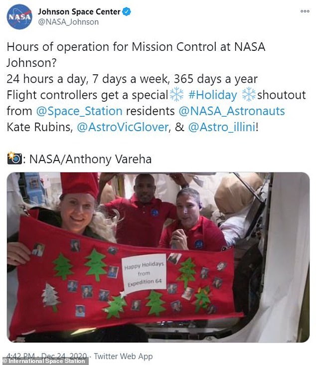 Astronaut Kate Rubins (left) Victor Glover and Mike Hopkins wish us a happy holidays from 254 miles above the Earth. Rubins challenged Mission Control at Houston's Johnson Space Center to a Christmas-decorating contest using only materials on hand