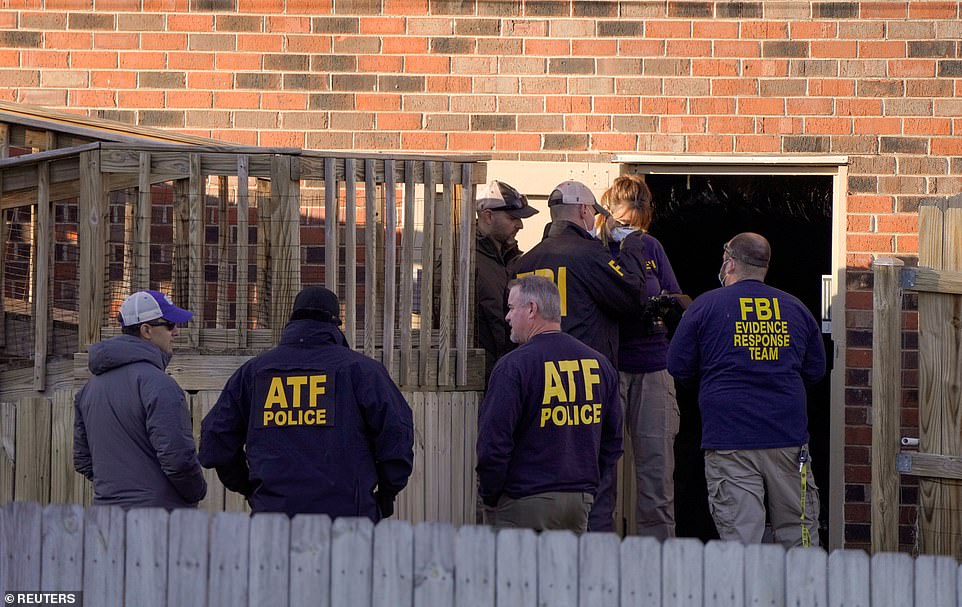 ATF police were seen searching the house and removing evidence from the basement