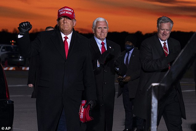 Trump has been reportedly lashing out over his election loss, with Mike Pence and Chief of Staff Mark Meadows getting the brunt of his wrath. Trump with Pence and Meadows above in November