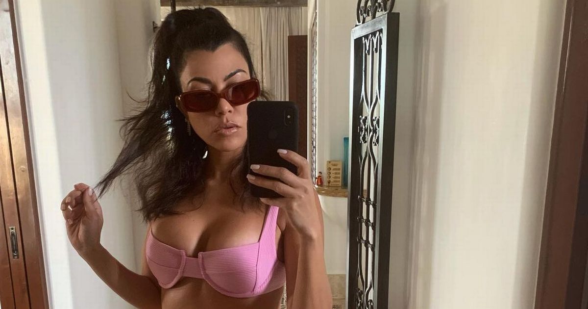 Kourtney Kardashian sparks pregnancy rumours with ‘baby bump’ bikini pics