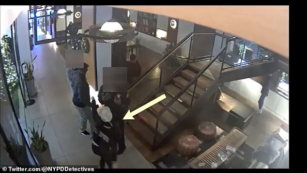 The new footage casts new light on Saturday's events in the lobby of the Arlo Hotel in Manhattan. It shows four people - identified as the woman, Keyon, Keyon Jr. and another individual standing at the bottom of the stairs in the lobby