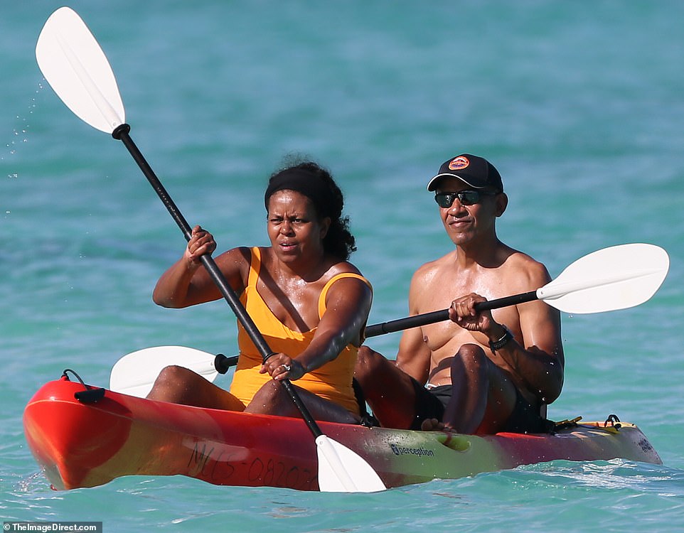 Barack and Michelle warm up for the holidays in Hawaii with couple’s kayak outing