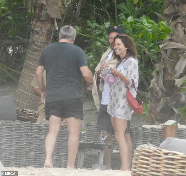 Brooke Burke is the picture of happiness on a romantic retreat in Mexico with her boyfriend