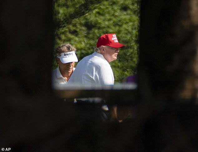 Donald Trump spotted playing golf with Bernhard Langer a week after pardoning the golfer’s friend